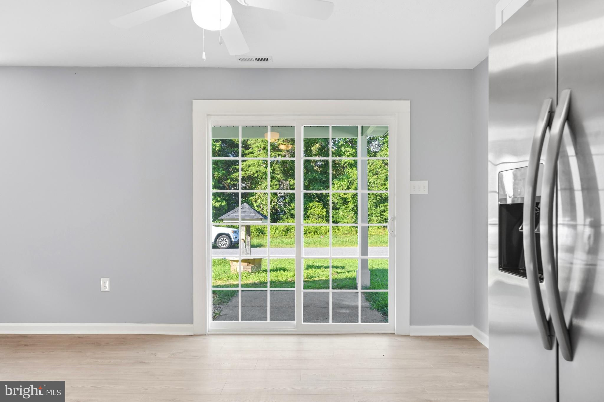 650 Field Road Lusby, MD 20657 - Photo 12 of 27 Direct access to the covered patio.