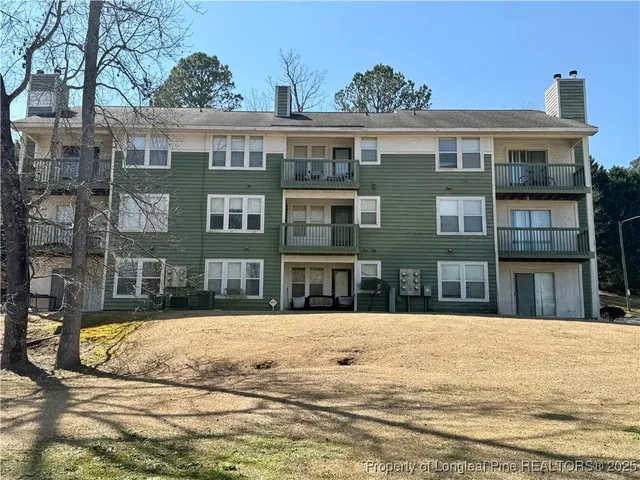 a view of a building with a swimming pool
