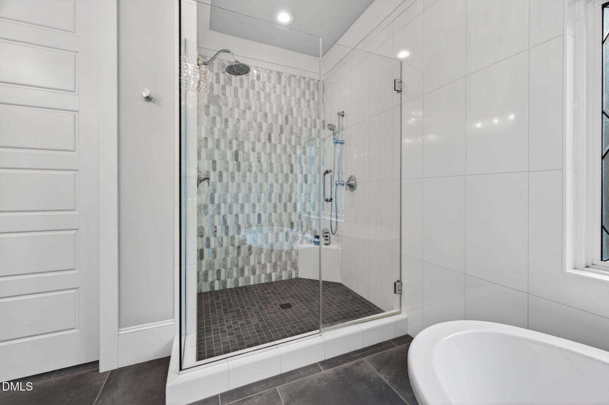 3417 Edgemont Drive Raleigh, NC 27612 - Photo 35 of 83 a bathroom with a shower a toilet and a shower
