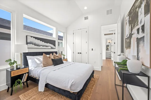 a bathroom with a shower sink and mirror