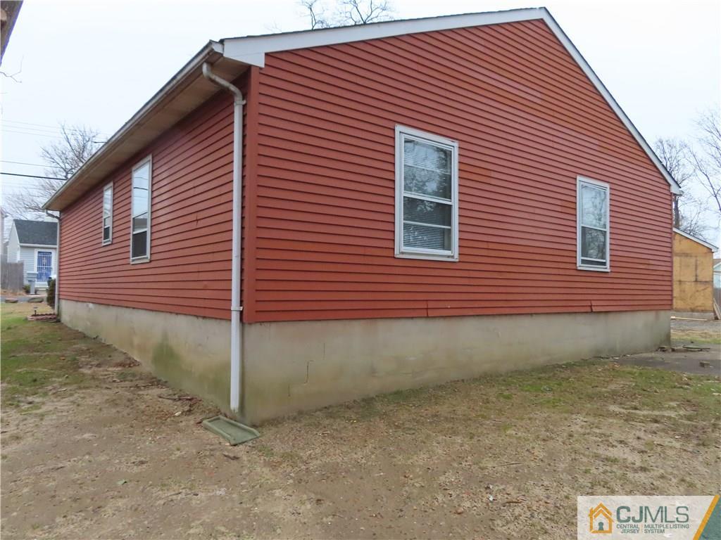 499 Harding Road Old Bridge, NJ 08879 - Photo 2 of 18 a front view of a house