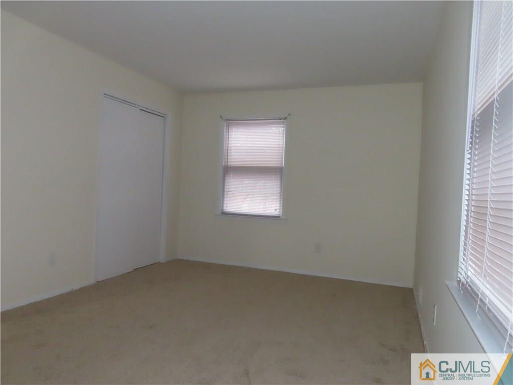 499 Harding Road Old Bridge, NJ 08879 - Photo 11 of 18 an empty room with a window