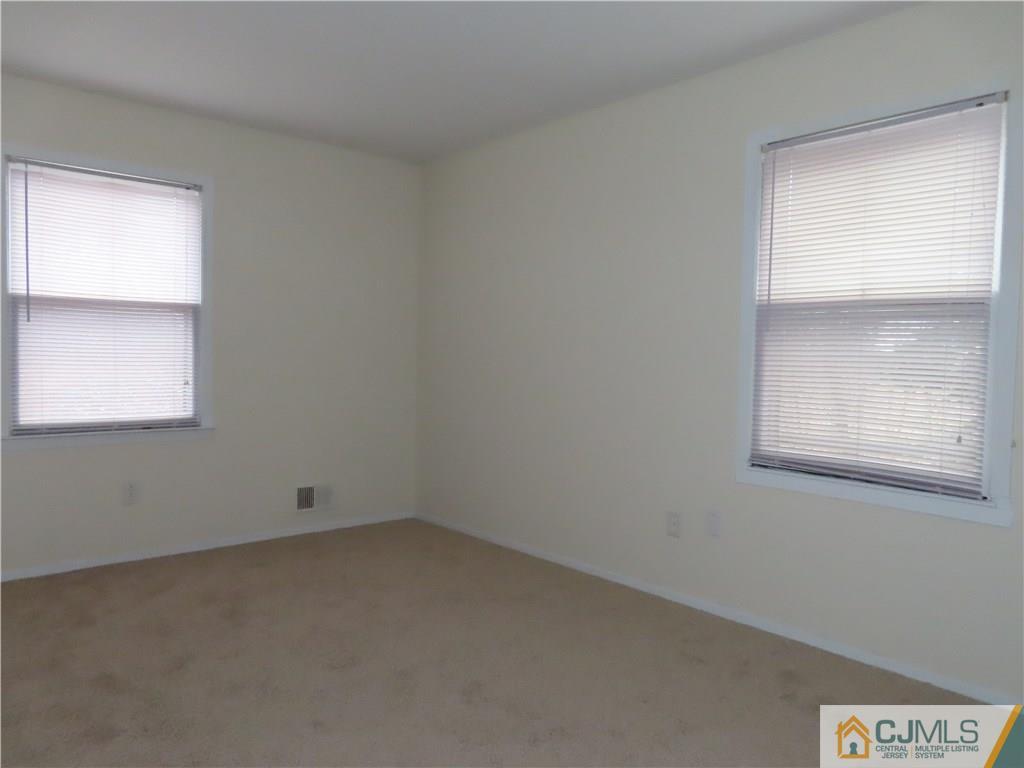 499 Harding Road Old Bridge, NJ 08879 - Photo 13 of 18 an empty room with a window