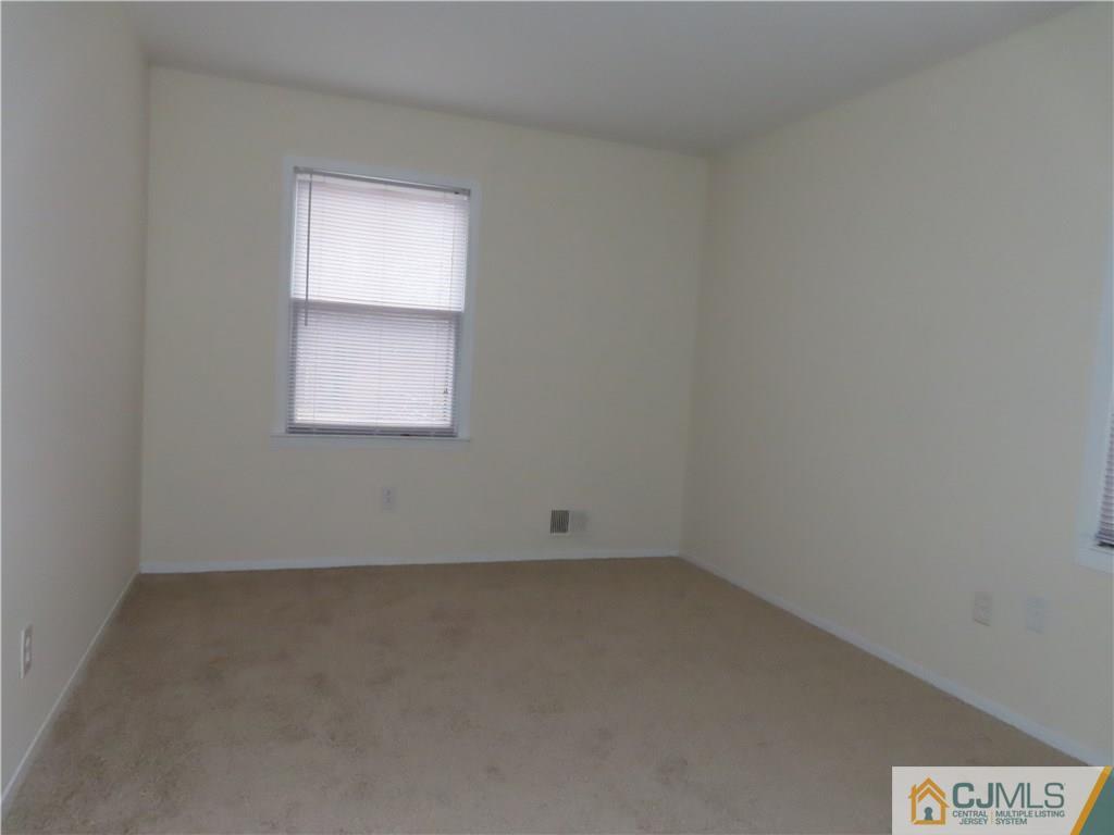 499 Harding Road Old Bridge, NJ 08879 - Photo 14 of 18 an empty room with a window