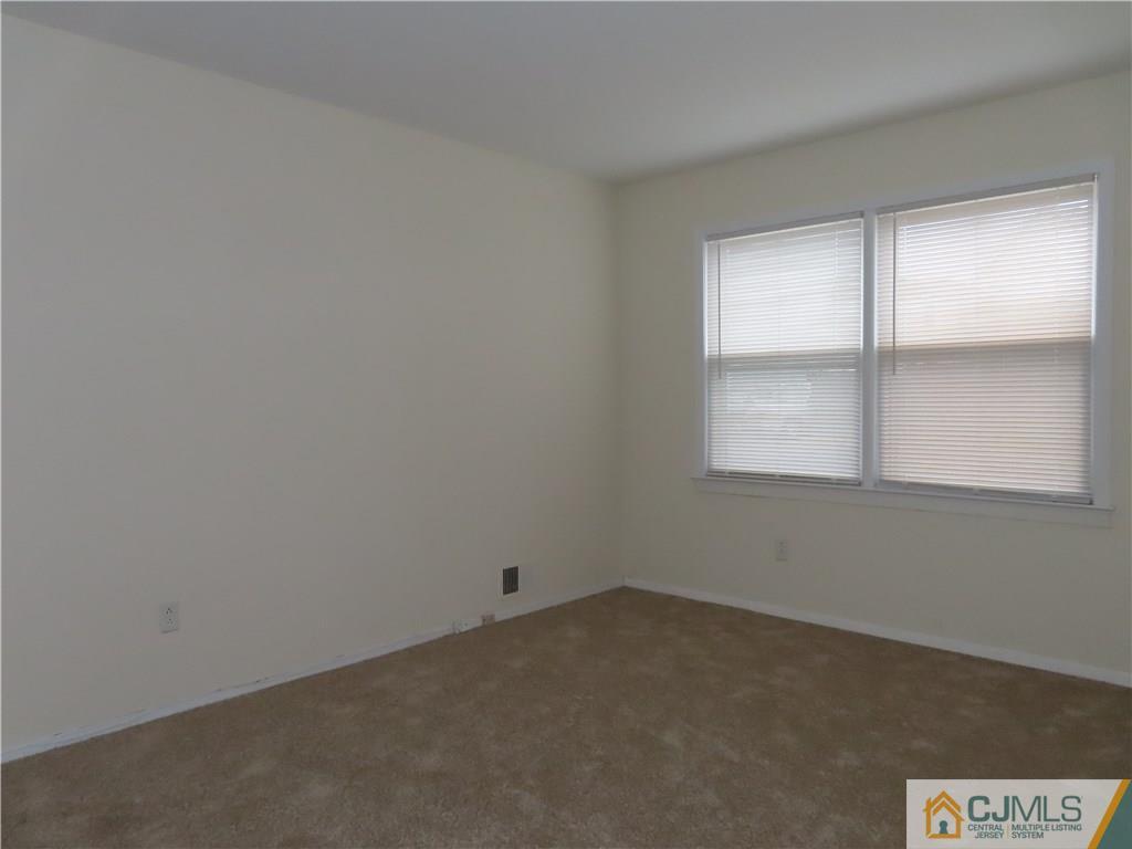 499 Harding Road Old Bridge, NJ 08879 - Photo 15 of 18 an empty room with a window
