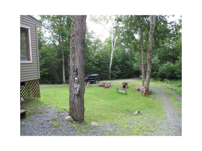 131 Cottage Road Rangeley, ME 04970 - Photo 3 of 20 Exterior Front.