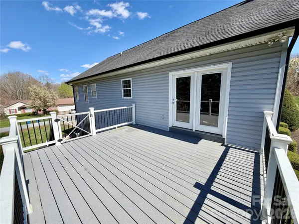 a view of a house with a roof deck