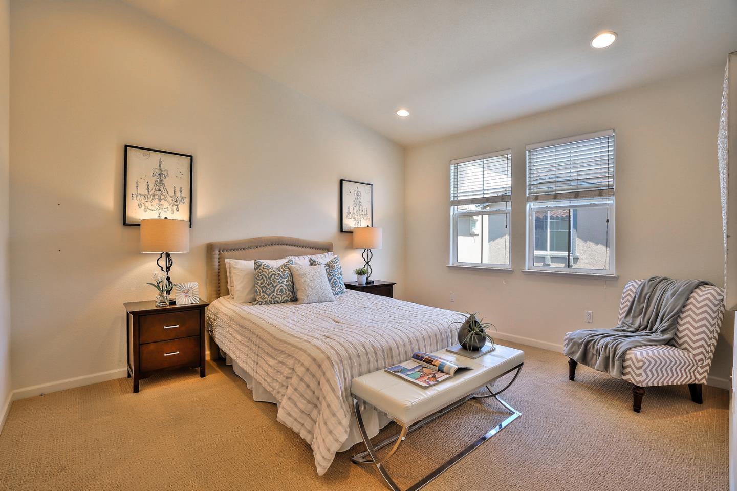 1088 Vida Larga Loop Milpitas, CA 95035 - Photo 12 of 29 a bedroom with a bed and a couch