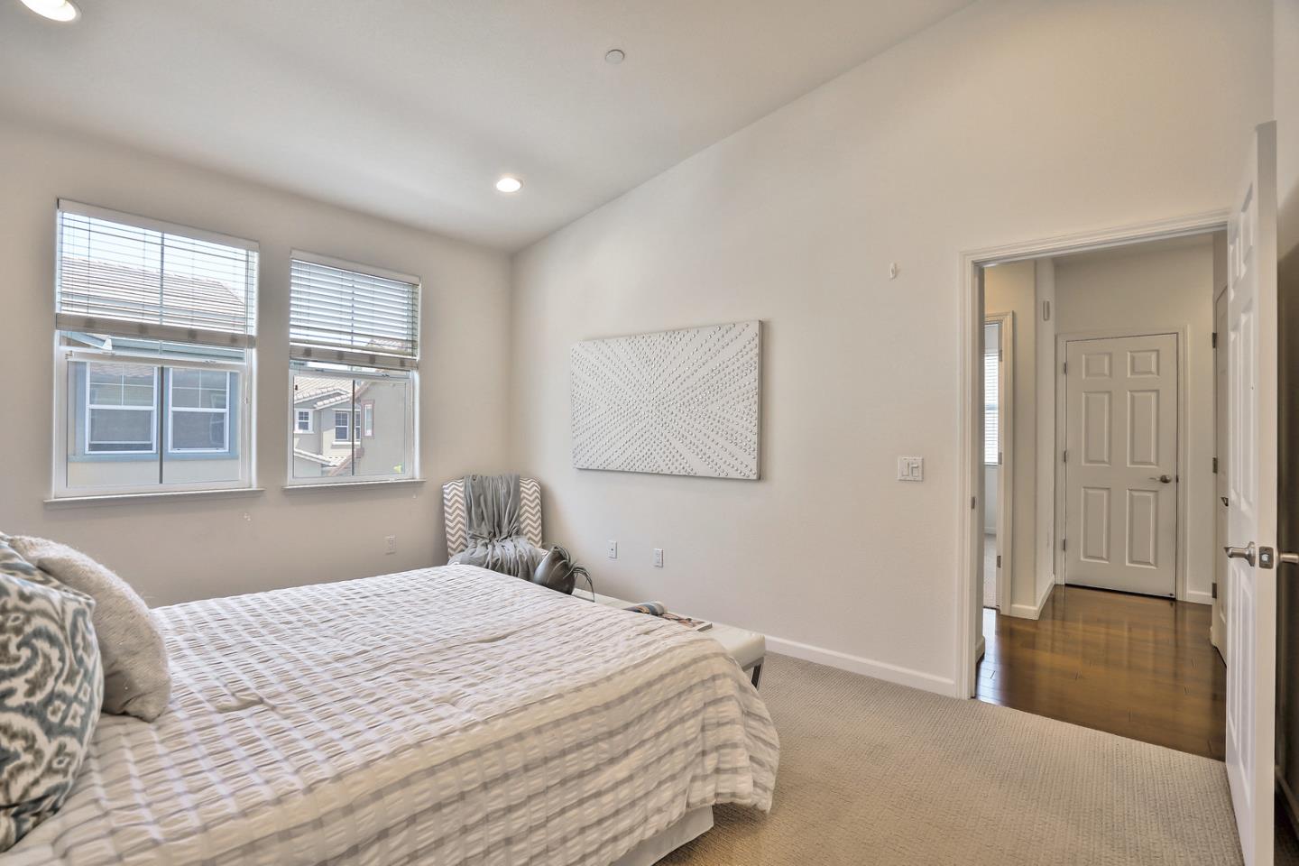 1088 Vida Larga Loop Milpitas, CA 95035 - Photo 13 of 29 a bedroom with a bed and a window