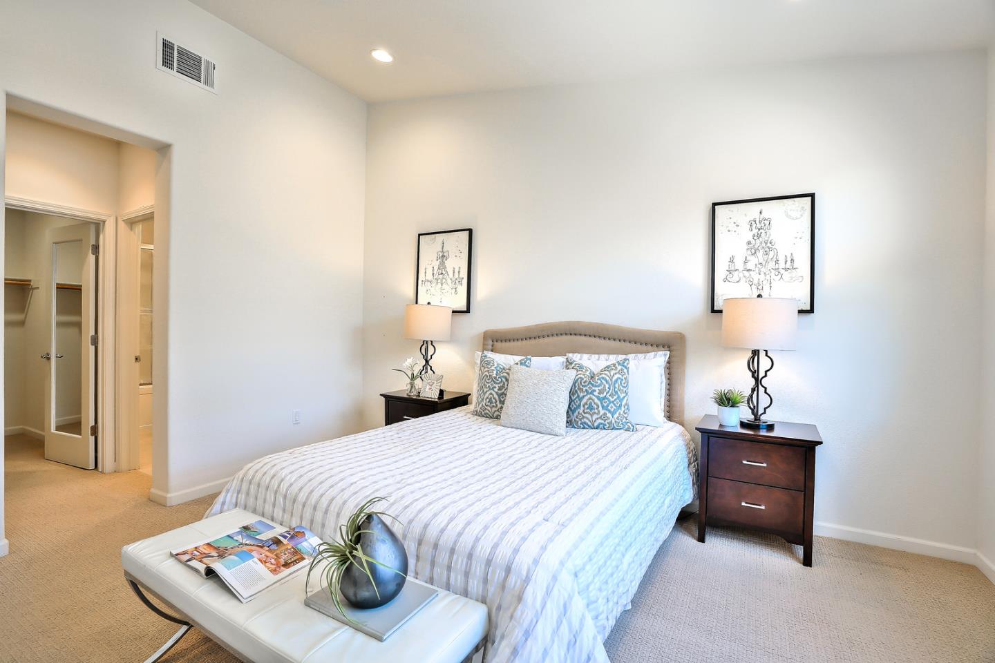 1088 Vida Larga Loop Milpitas, CA 95035 - Photo 14 of 29 a bedroom with a bed and a table