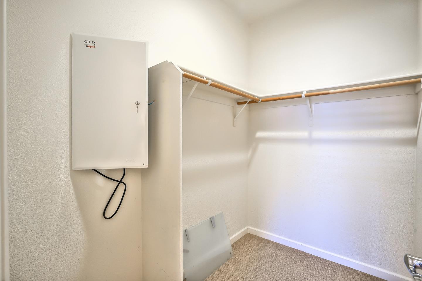 1088 Vida Larga Loop Milpitas, CA 95035 - Photo 15 of 29 a bathroom with a glass shower door