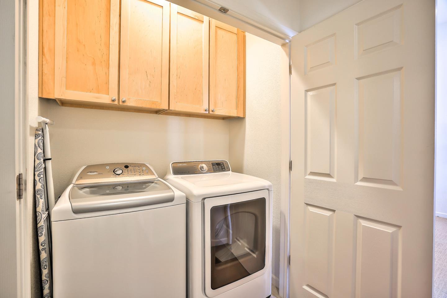 1088 Vida Larga Loop Milpitas, CA 95035 - Photo 20 of 29 a utility room with dryer and washer