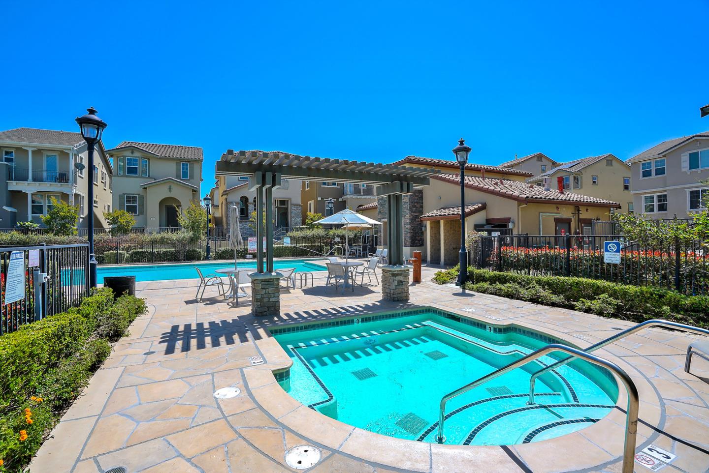 1088 Vida Larga Loop Milpitas, CA 95035 - Photo 29 of 29 a view of a house with swimming pool and sitting area