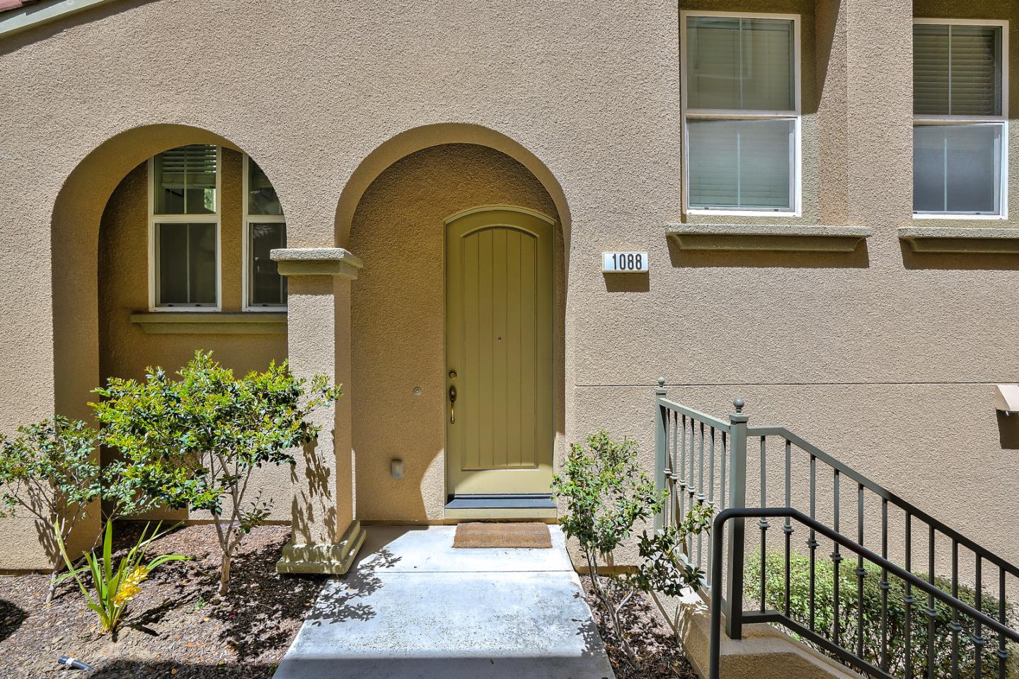 1088 Vida Larga Loop Milpitas, CA 95035 - Photo 3 of 29 a front view of a house having yard