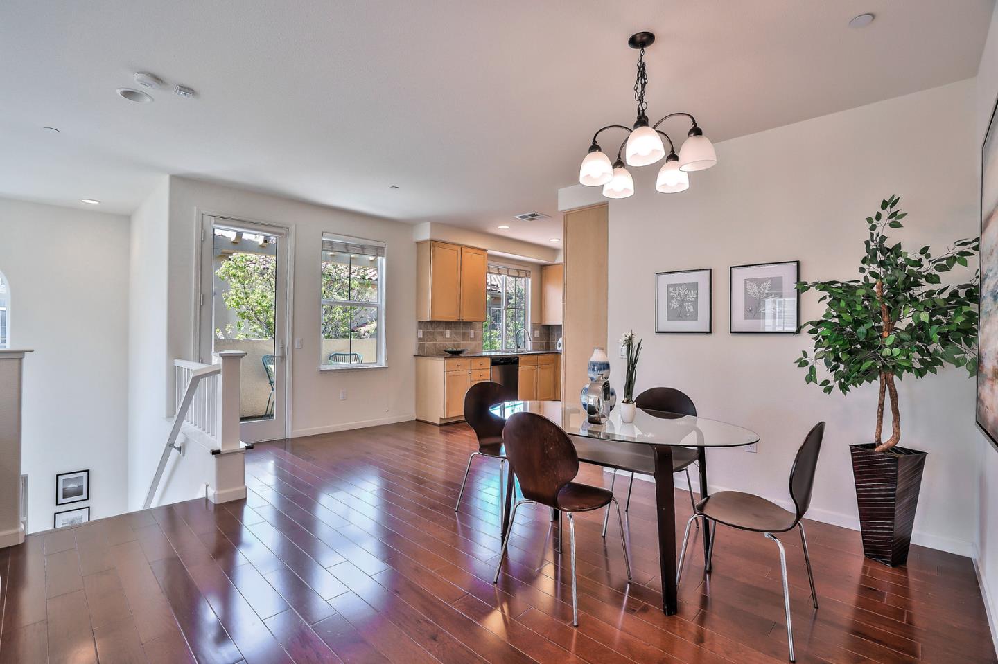 1088 Vida Larga Loop Milpitas, CA 95035 - Photo 7 of 29 a view of a dining room with furniture window and wooden floor