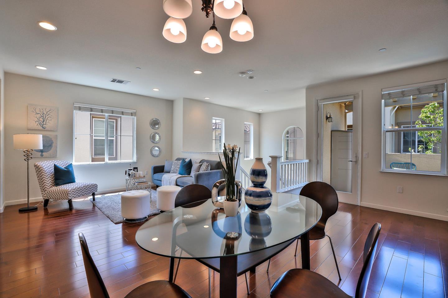 1088 Vida Larga Loop Milpitas, CA 95035 - Photo 8 of 29 a view of a dining room with furniture window and wooden floor