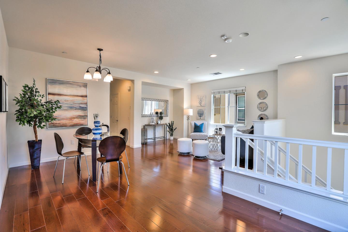 1088 Vida Larga Loop Milpitas, CA 95035 - Photo 9 of 29 a view of a dining room with furniture window and wooden floor
