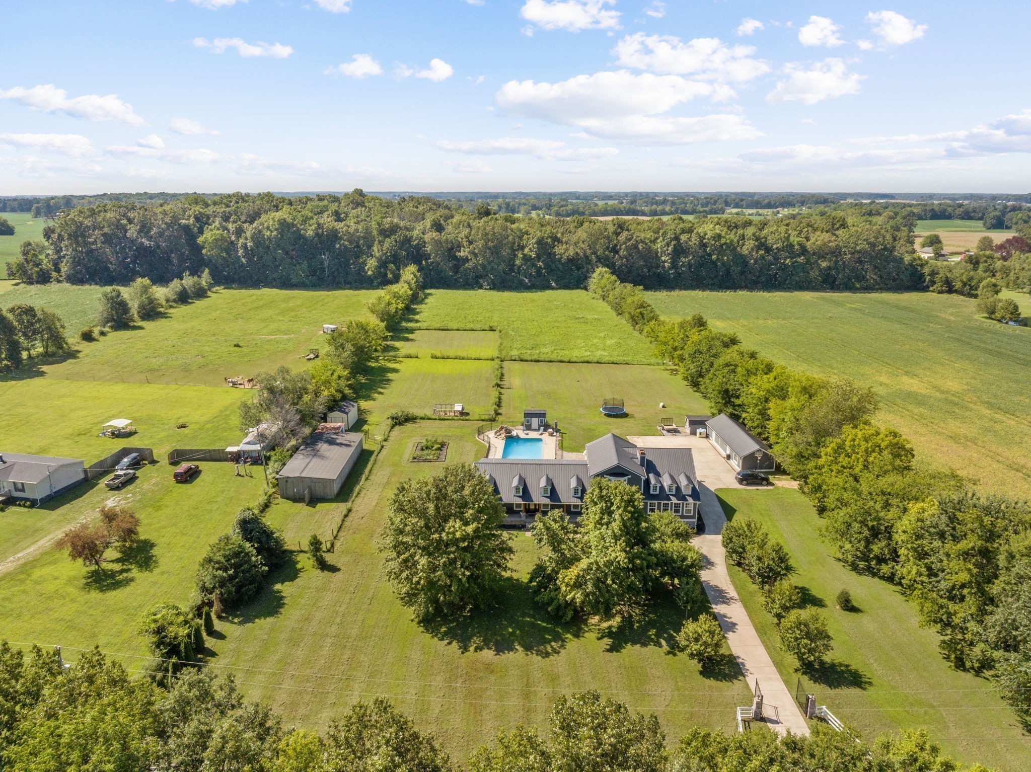 6931 Cowan Road Springfield, TN 37172 - Photo 3 of 68 a view of a lake with a beach
