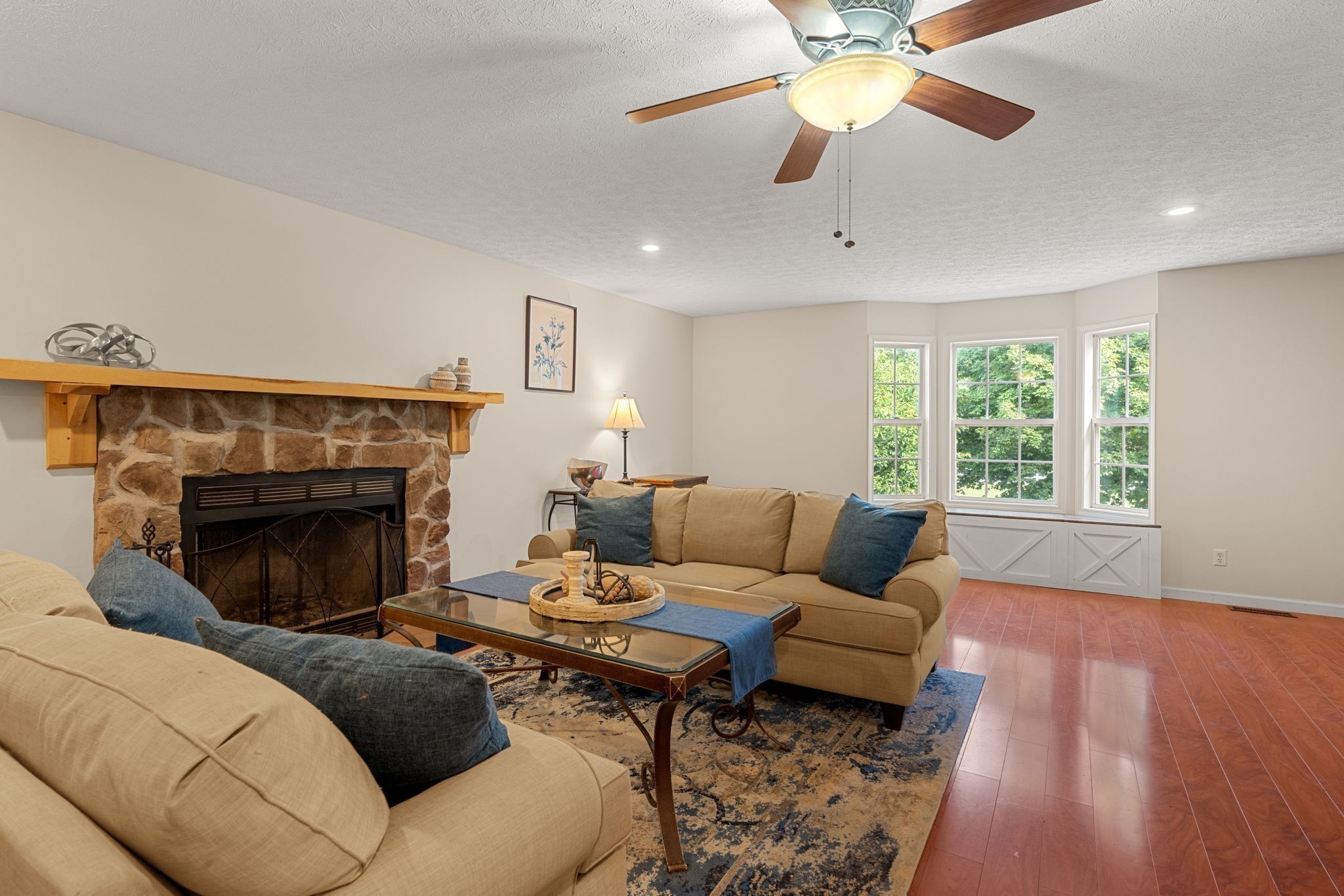 6931 Cowan Road Springfield, TN 37172 - Photo 31 of 68 a living room with furniture and a fireplace