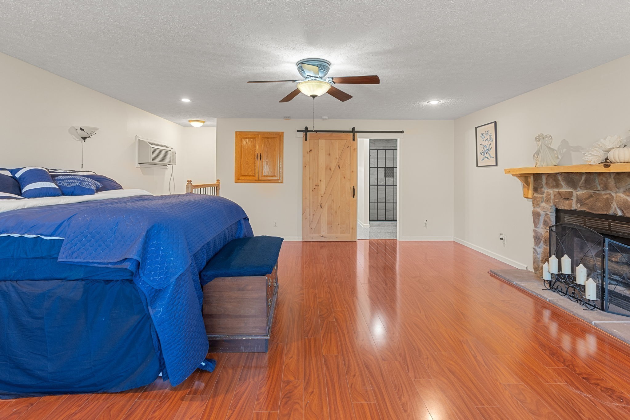 6931 Cowan Road Springfield, TN 37172 - Photo 34 of 68 a bed room with a bed and a chandelier