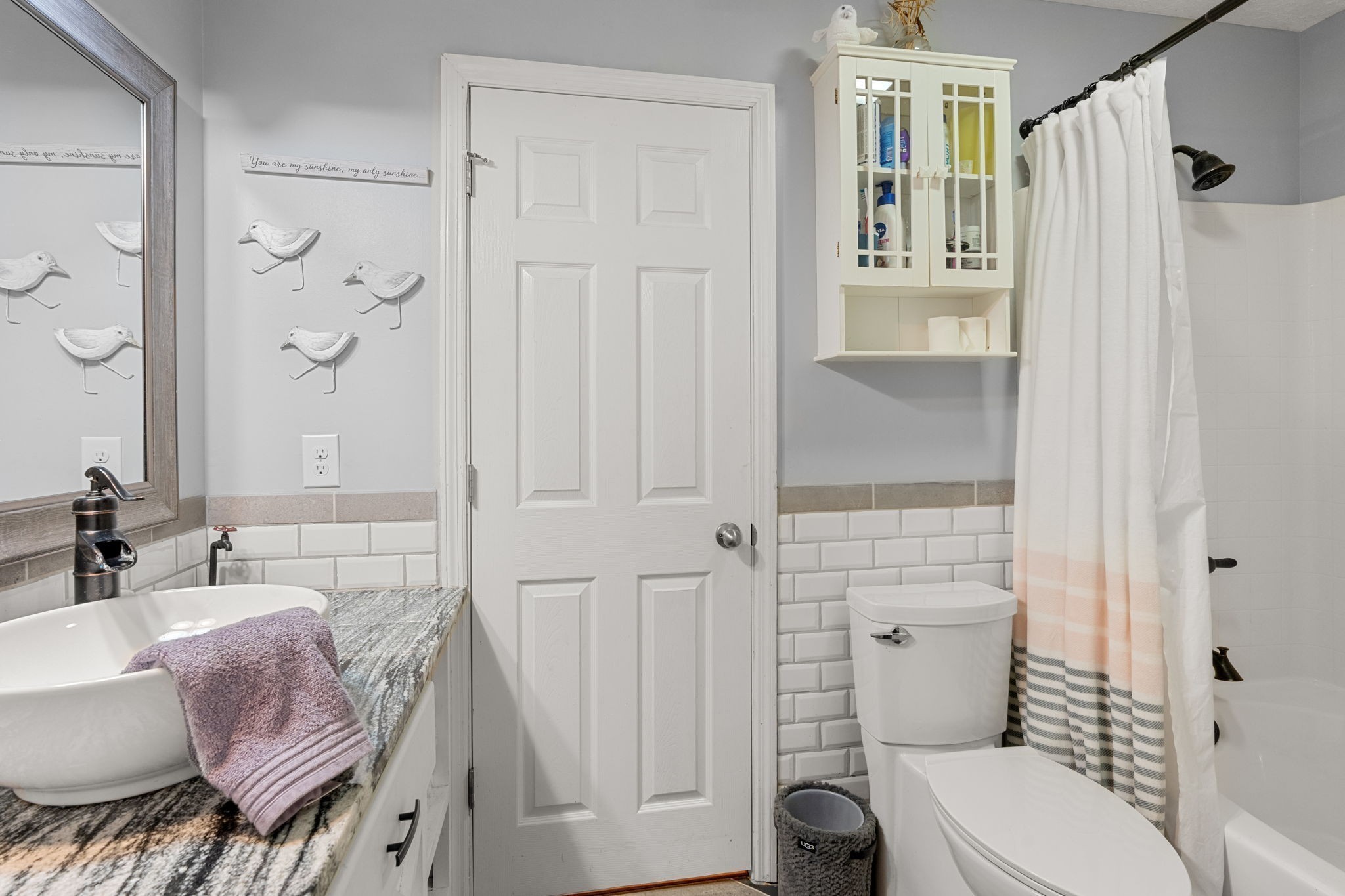 6931 Cowan Road Springfield, TN 37172 - Photo 39 of 68 a bathroom with a granite countertop sink toilet and shower