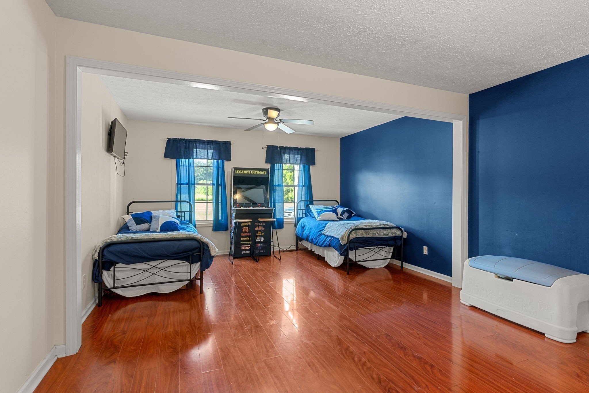 6931 Cowan Road Springfield, TN 37172 - Photo 40 of 68 a bedroom with furniture and wooden floor