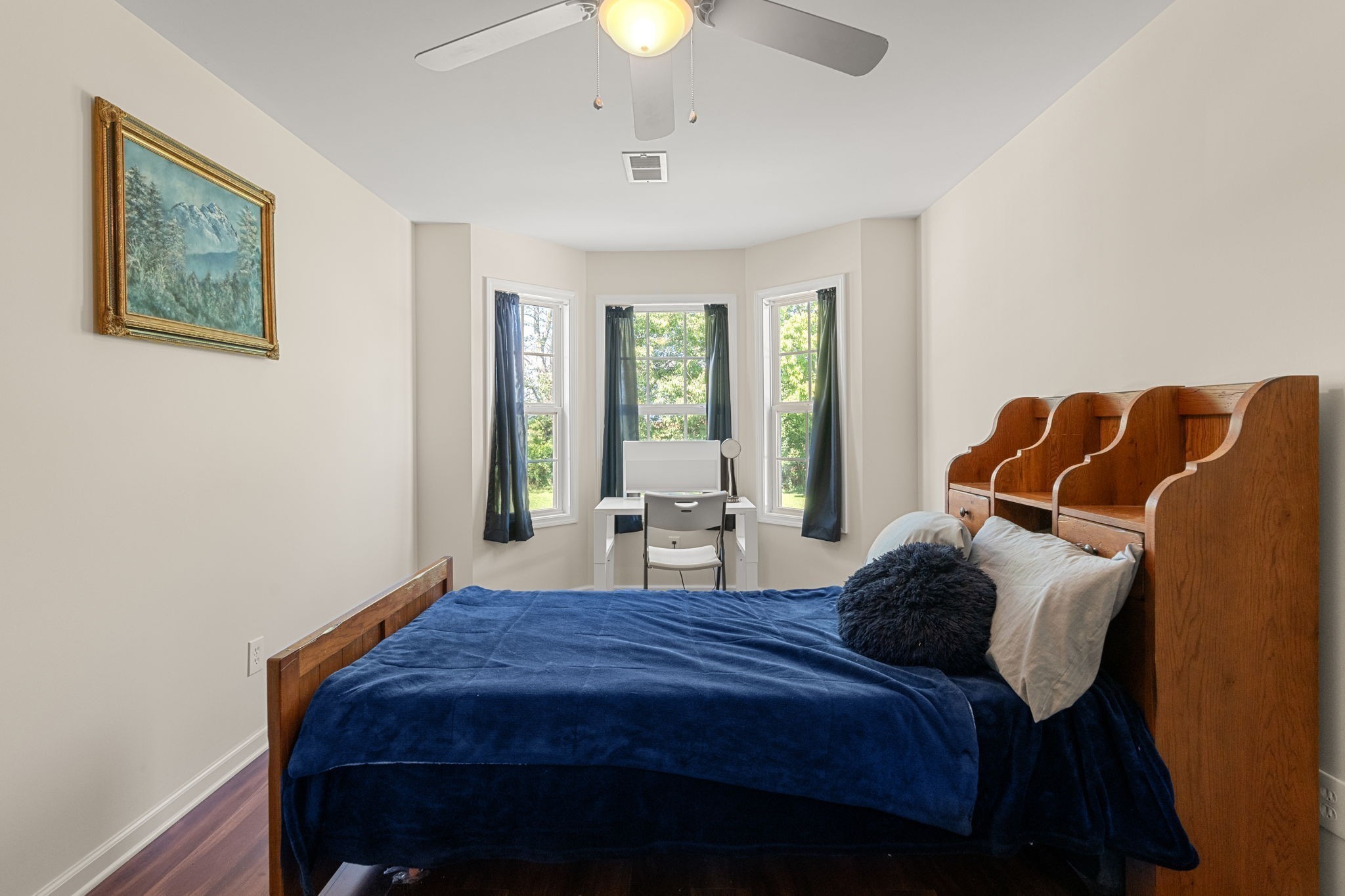 6931 Cowan Road Springfield, TN 37172 - Photo 45 of 68 a bedroom with a bed and a chandelier