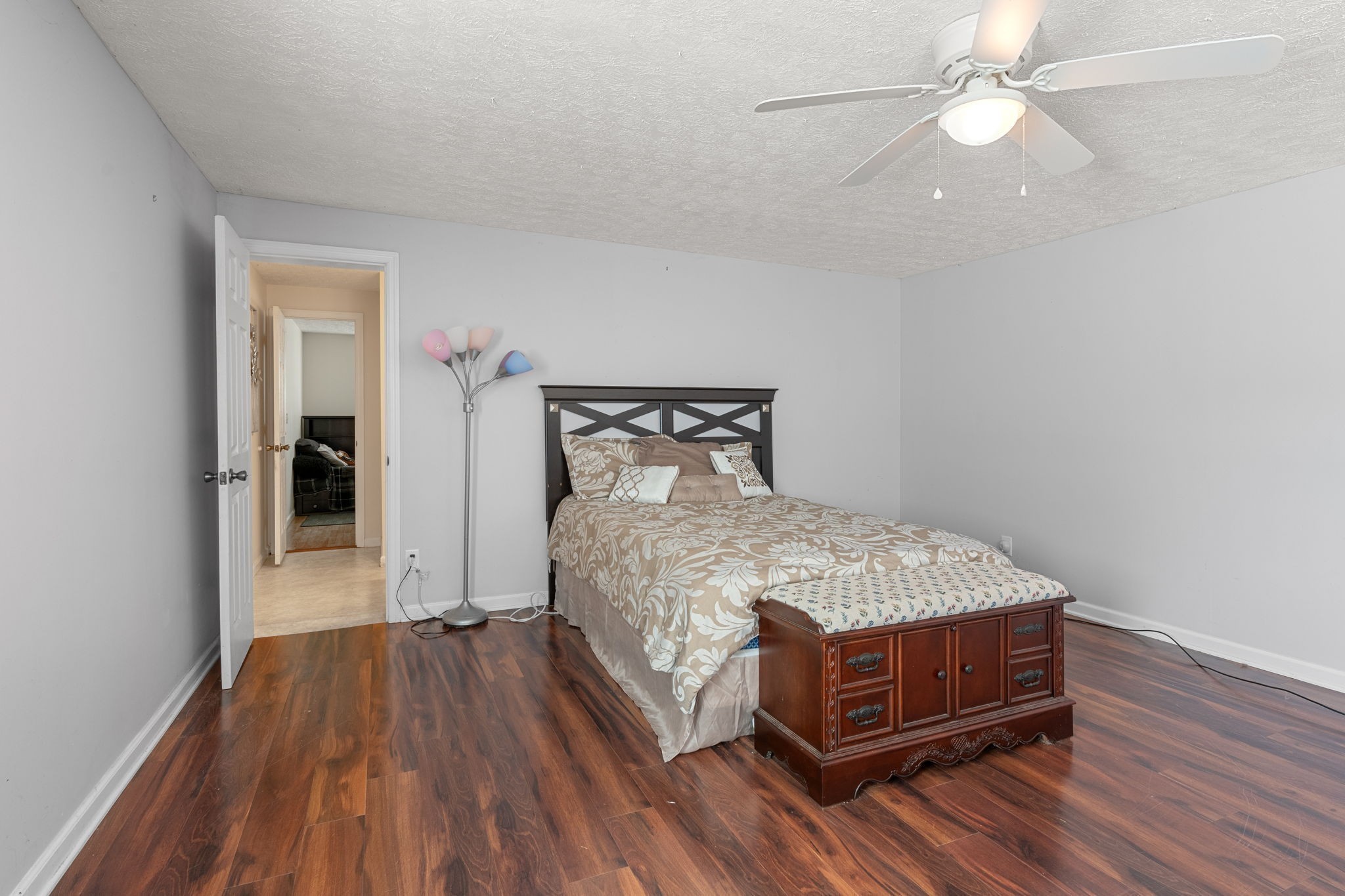 6931 Cowan Road Springfield, TN 37172 - Photo 49 of 68 a bedroom with a bed and wooden floor
