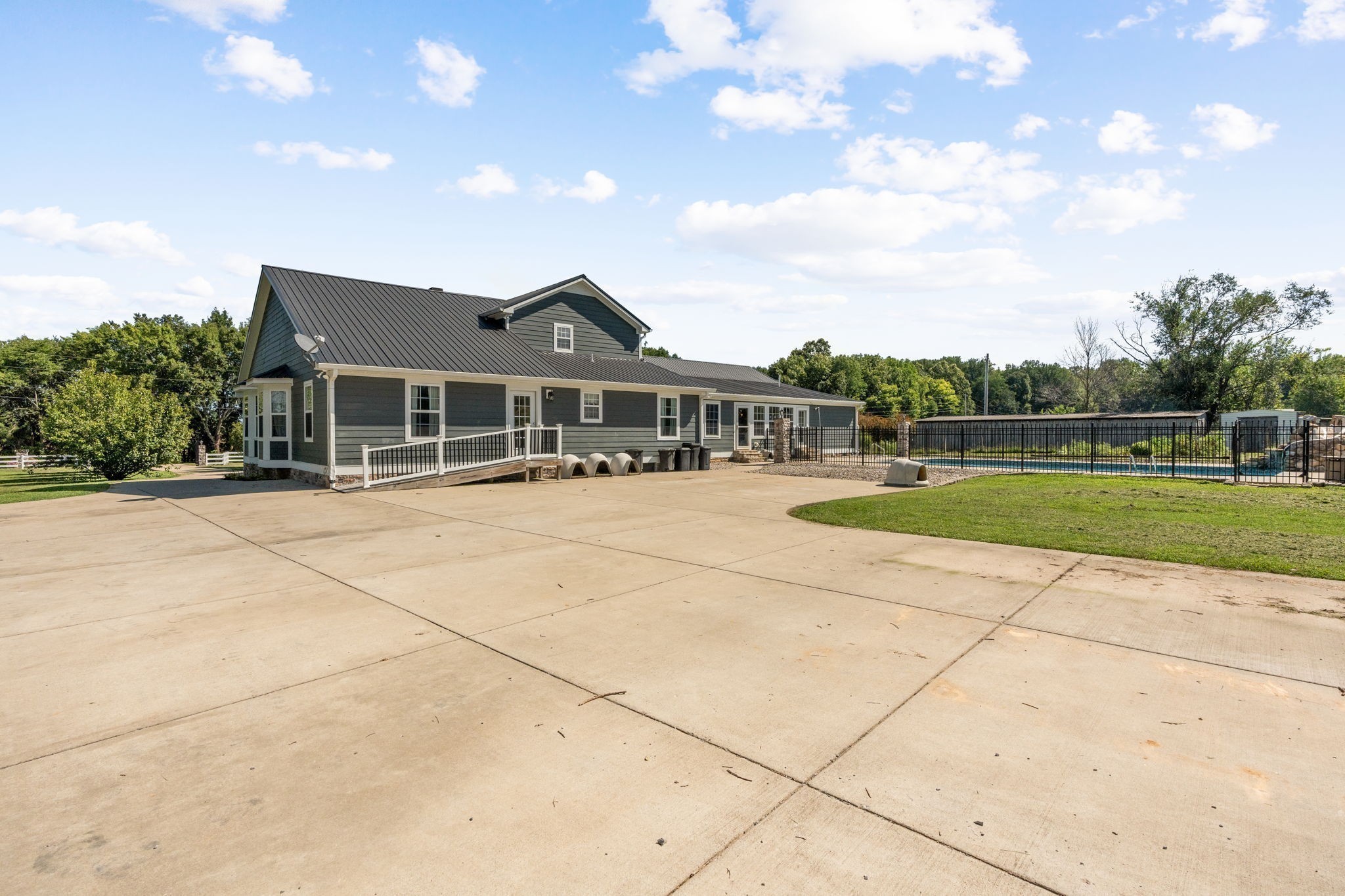 6931 Cowan Road Springfield, TN 37172 - Photo 53 of 68 a view of a house with a backyard
