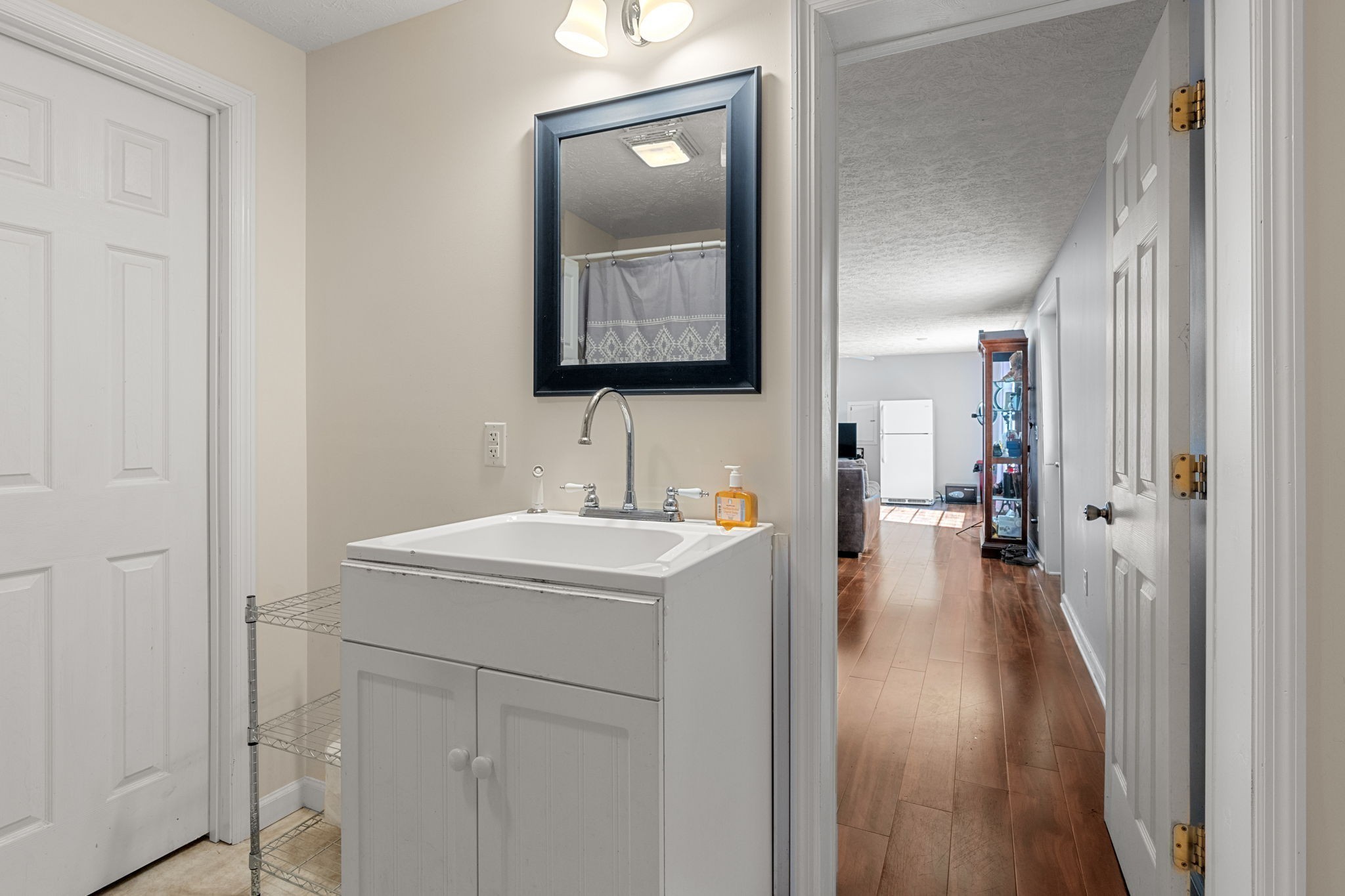 6931 Cowan Road Springfield, TN 37172 - Photo 63 of 68 a bathroom with a sink and a mirror