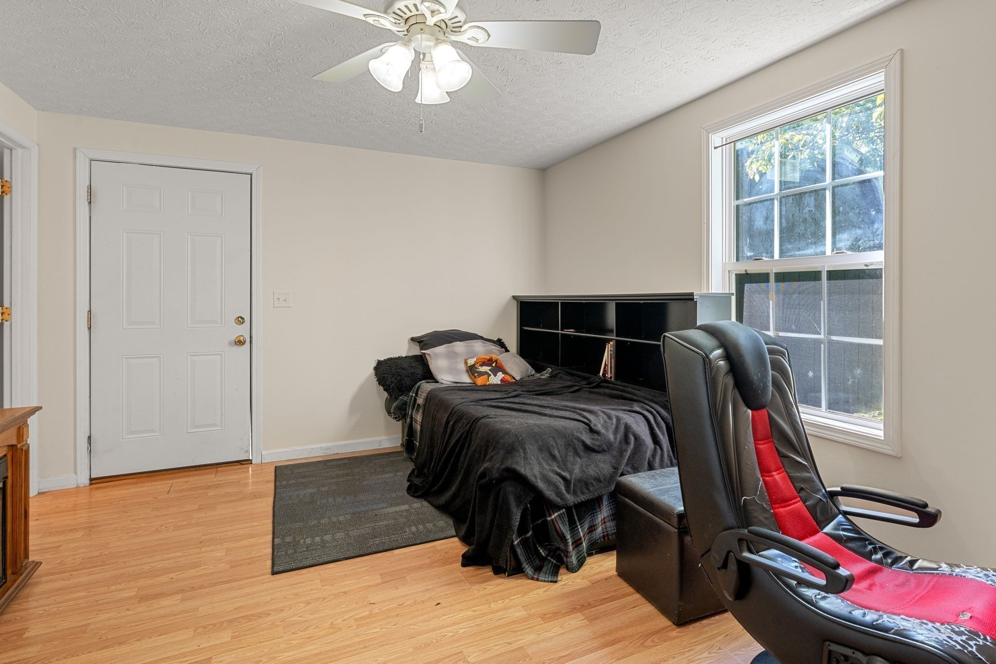 6931 Cowan Road Springfield, TN 37172 - Photo 66 of 68 a bedroom with a bed and wooden floor