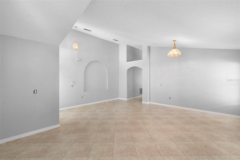 559 Saddle Ridge Drive Davenport, FL 33896 - Photo 31 of 42 a view of an empty room with a window