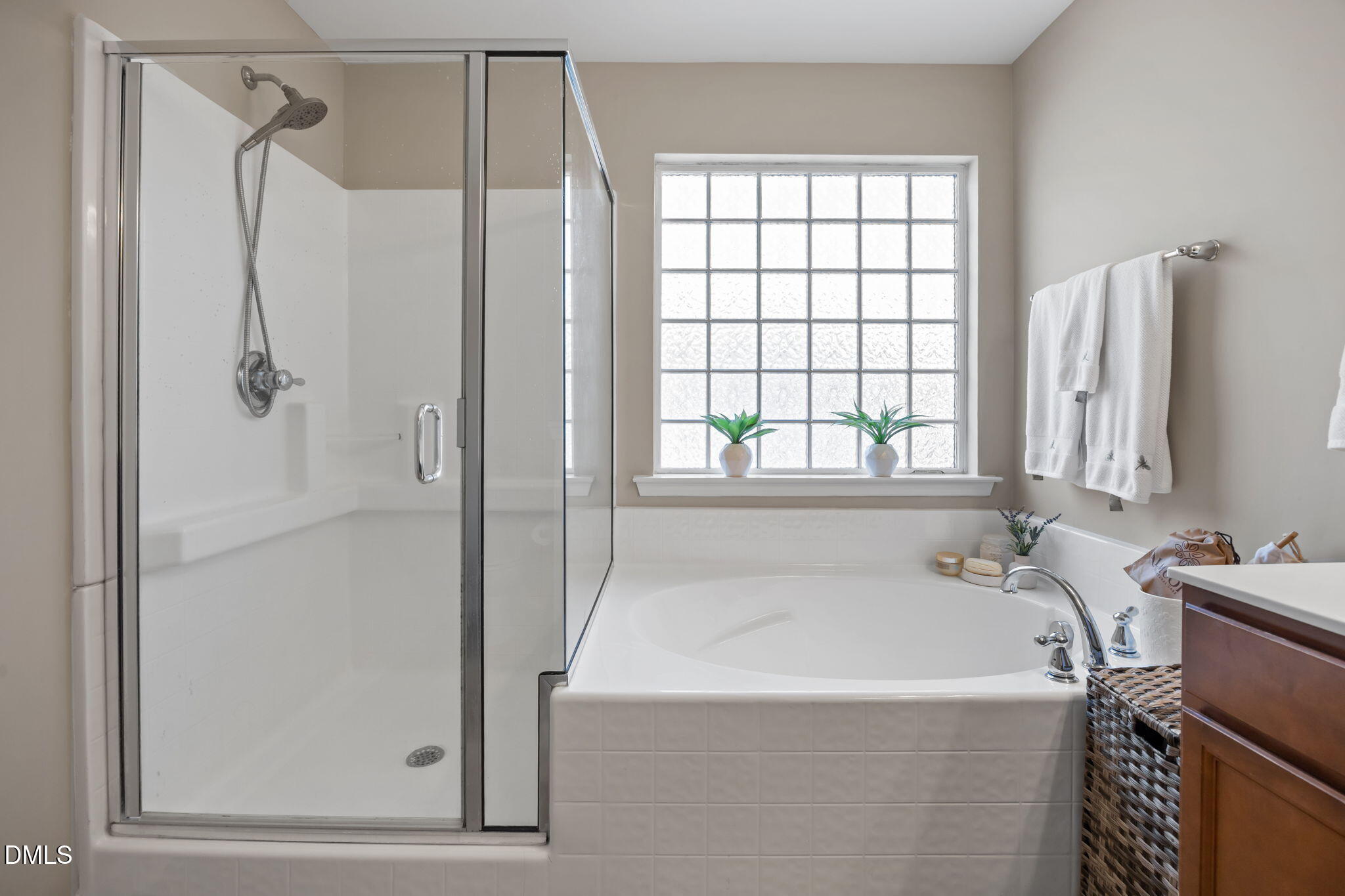 5049 Jelynn Street Raleigh, NC 27616 - Photo 16 of 33 a bathroom with a bathtub and a shower