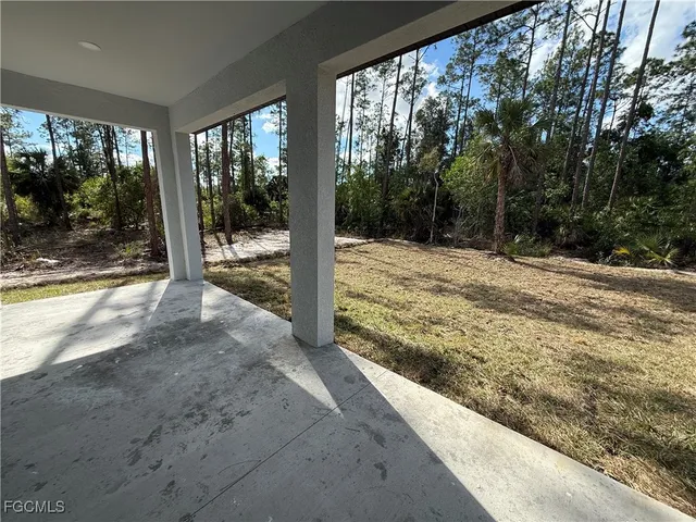 a view of backyard of a house