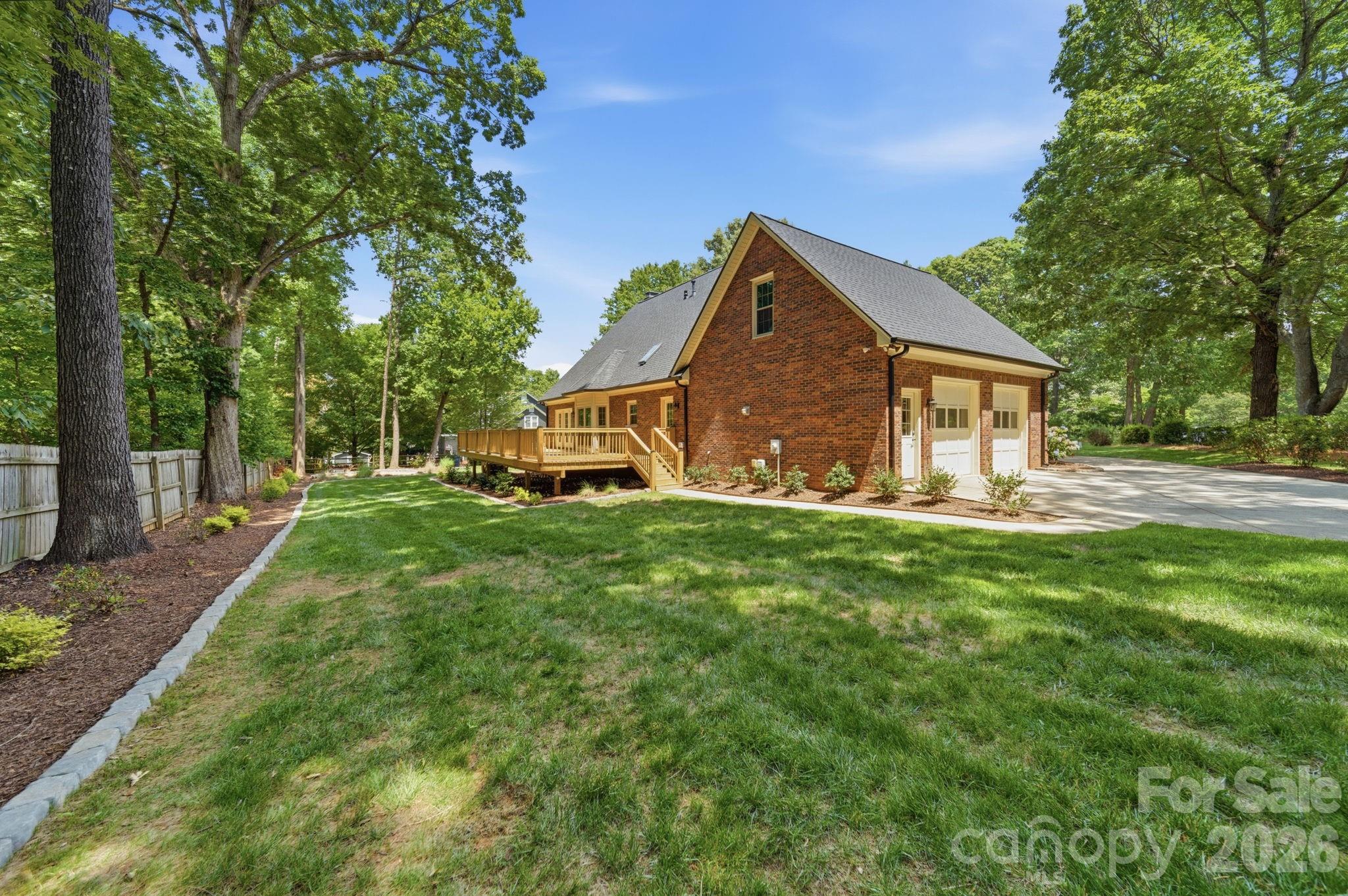 5243 Mintridge Road Mint Hill, NC 28227 - Photo 5 of 43 a front view of a house with garden