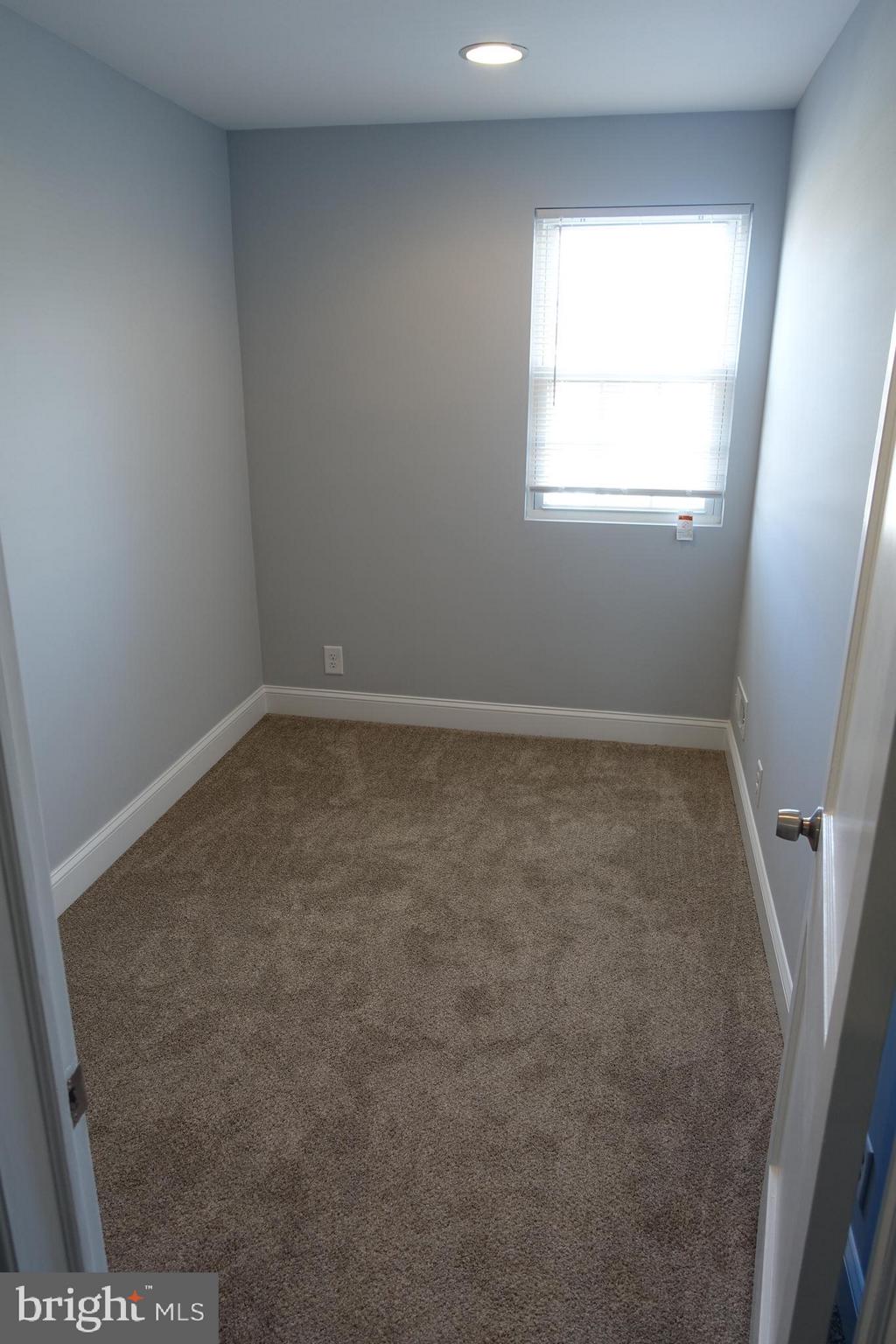 338 Grovethorn Road Baltimore, MD 21220 - Photo 11 of 24 an empty room with a window