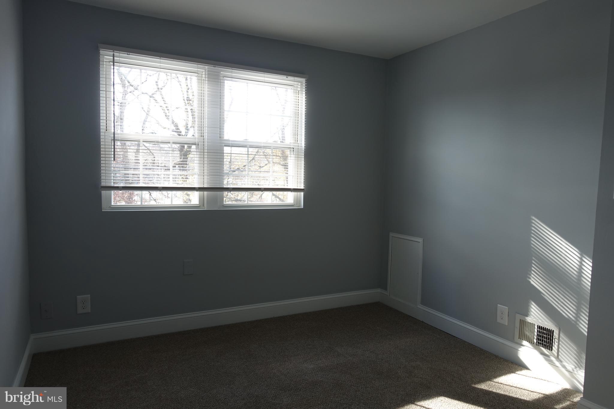 338 Grovethorn Road Baltimore, MD 21220 - Photo 13 of 24 an empty room with a window