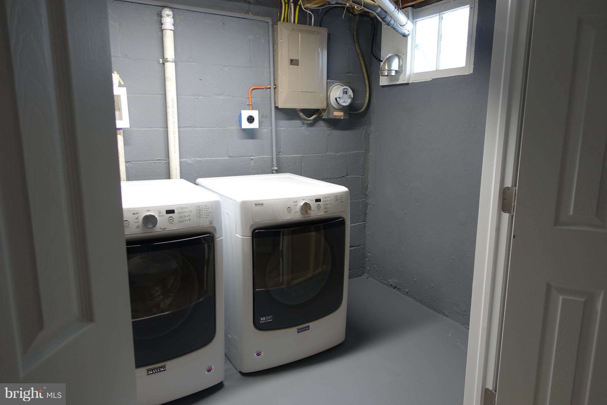 338 Grovethorn Road Baltimore, MD 21220 - Photo 17 of 24 a utility room with dryer and washer
