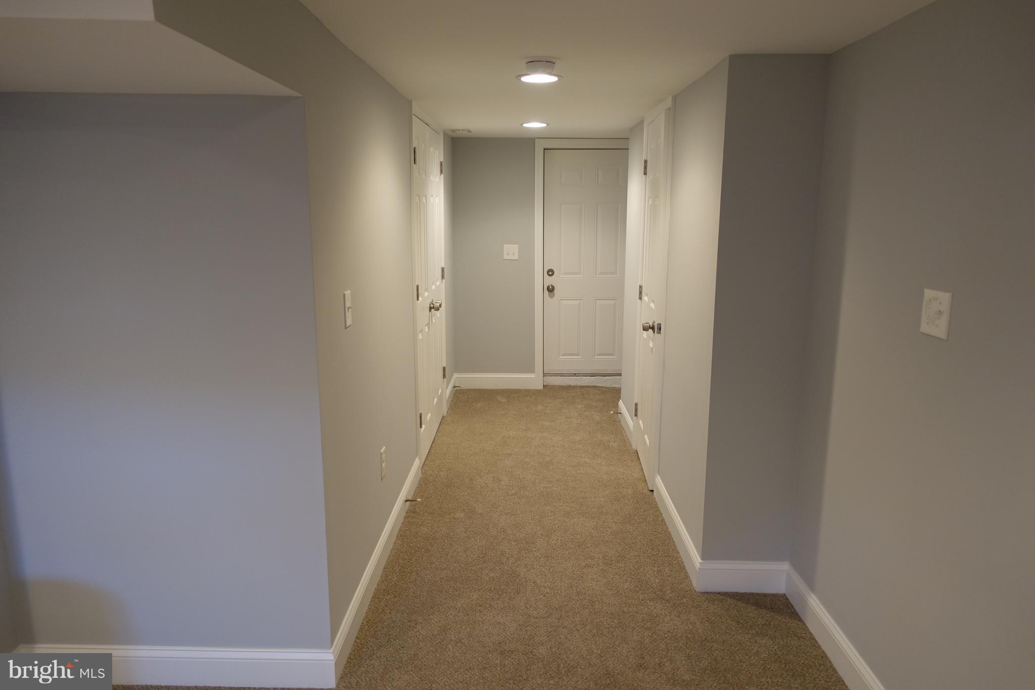 338 Grovethorn Road Baltimore, MD 21220 - Photo 21 of 24 a view of a hallway with wooden floor