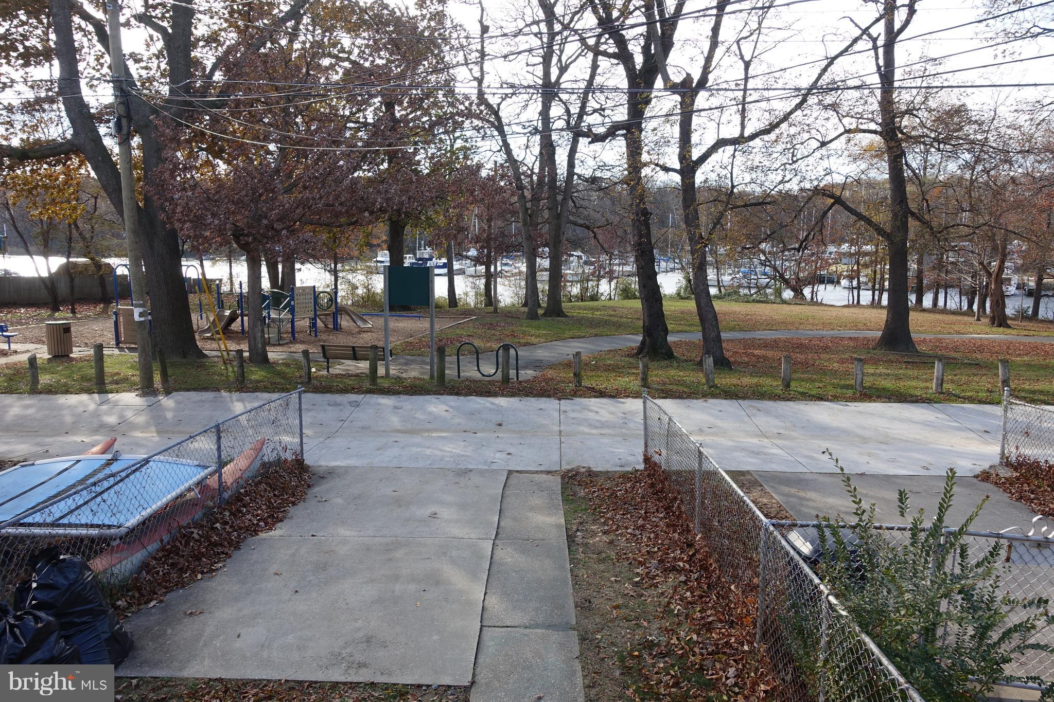 338 Grovethorn Road Baltimore, MD 21220 - Photo 23 of 24 a view of a yard with plants and trees