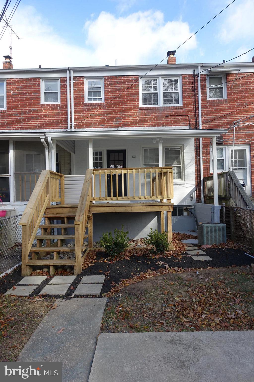 338 Grovethorn Road Baltimore, MD 21220 - Photo 24 of 24 a front view of a house with a yard