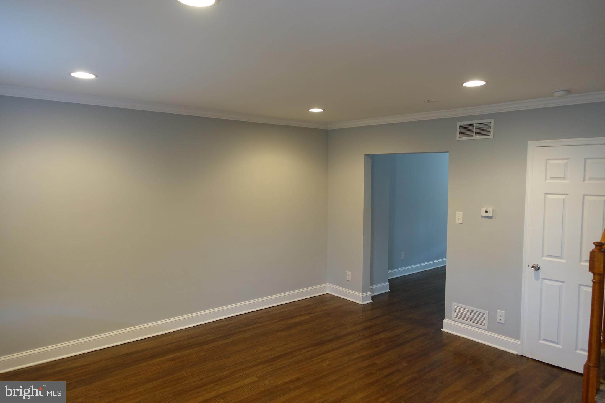 338 Grovethorn Road Baltimore, MD 21220 - Photo 4 of 24 a view of wooden floor in an empty room