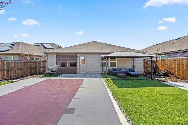 a front view of a house with yard