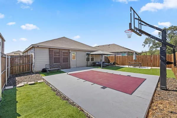 a front view of a house with yard