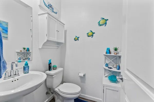 a bedroom with a bed and a television