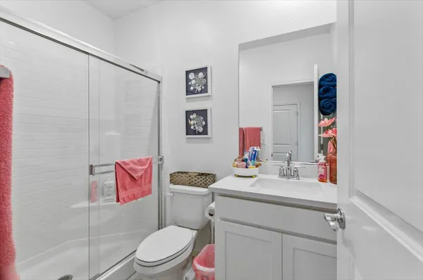 a view of a storage & utility room with washer and dryer