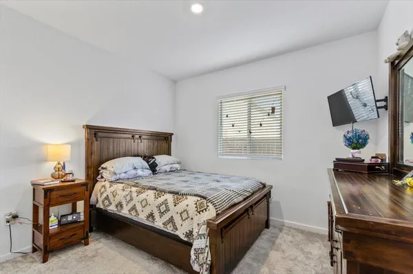 a view of a dinning table and chairs in the patio
