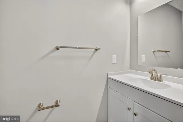 an empty room with wooden floor