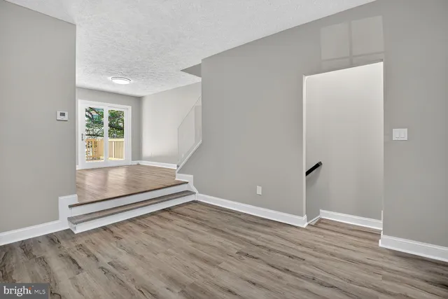 a bathroom with a sink and vanity