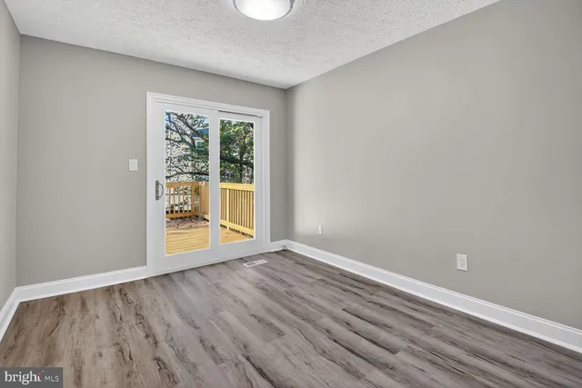 a view of wooden floor and stairs in a room